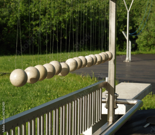oscilation balls in educational park