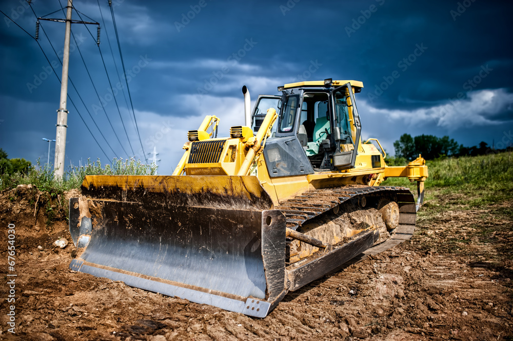 industrial backhoe, bulldozer moving earh and sand in sandpit industrial backhoe, bulldozer moving earh and sand in sandpit