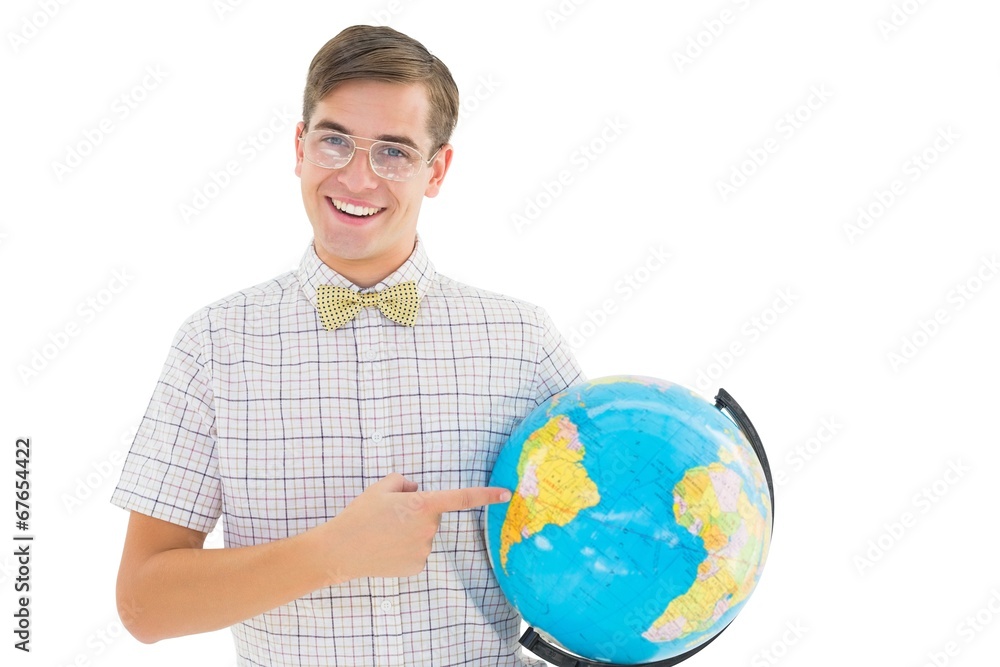 Geeky hipster holding a globe smiling at camera Geeky hipster holding a globe smiling at camera