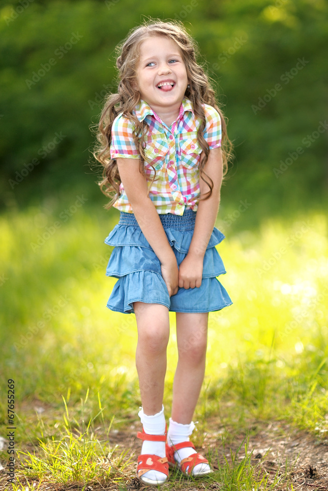 portrait of little girl outdoors in summer portrait of little girl outdoors in summer