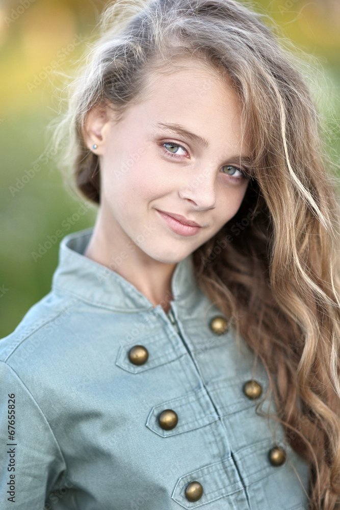 portrait of little girl outdoors in summer portrait of little girl outdoors in summer