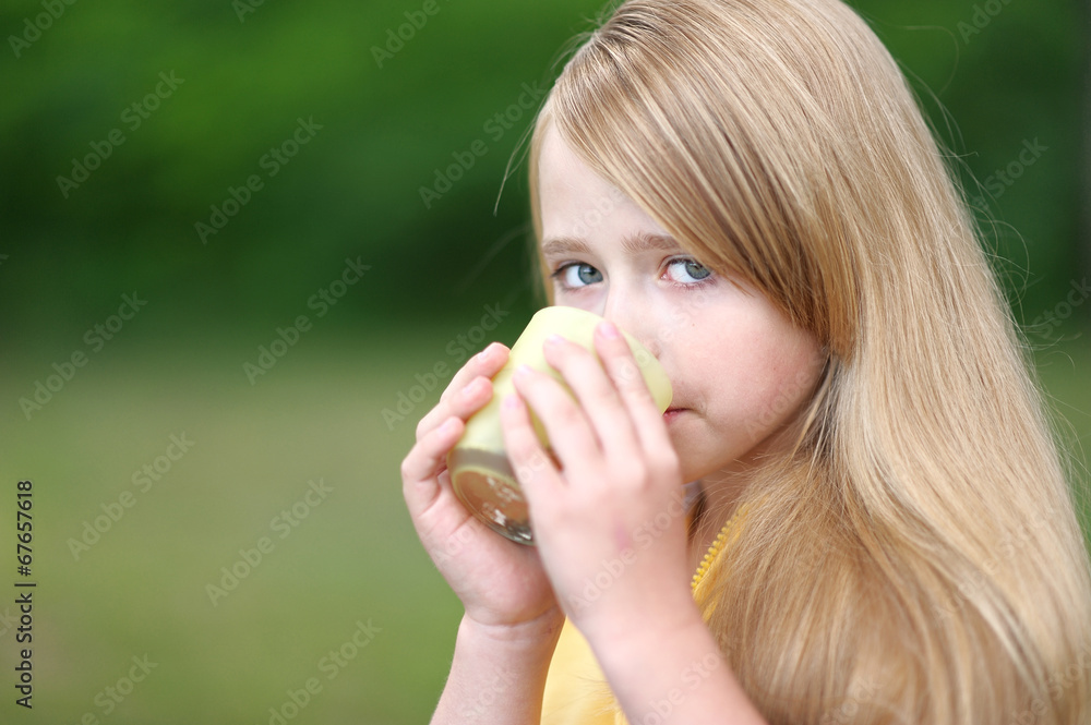 portrait of little girl outdoors in summer portrait of little girl outdoors in summer