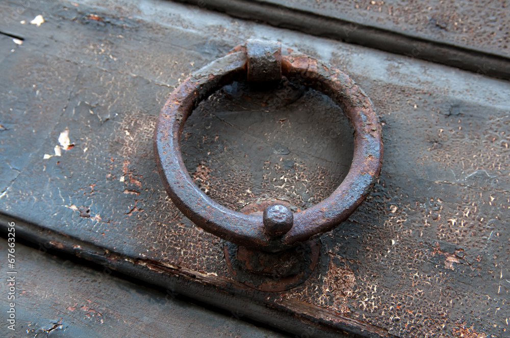 Old doorknob in the form of a steel ring Old doorknob in the form of a steel ring