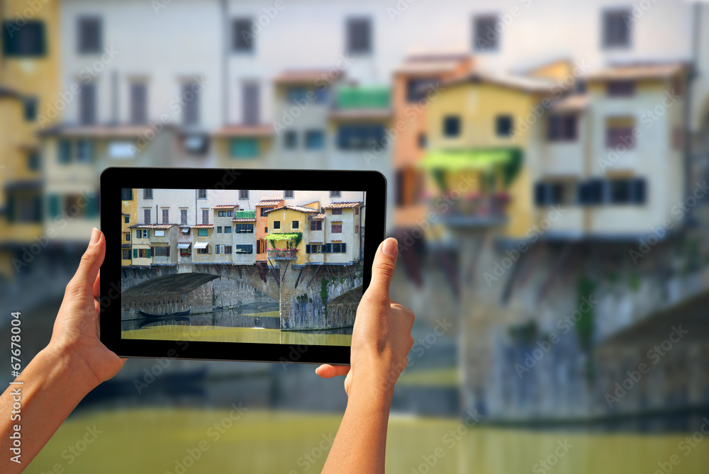 Ponte Vecchio Woman taking pictures on a tablet Ponte Vecchio Woman taking pictures on a tablet