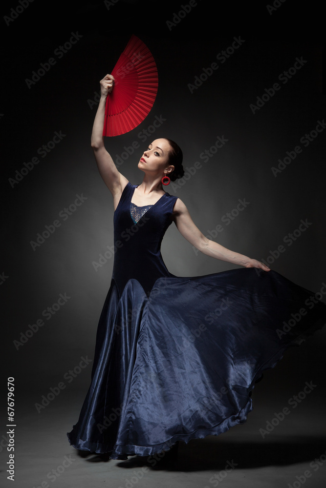 Naklejka premium woman dancing flamenco on black