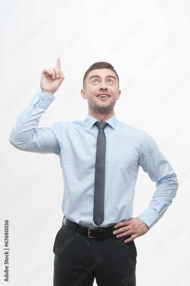 Junior handsome manager showing process of idea search Junior handsome manager showing process of idea search