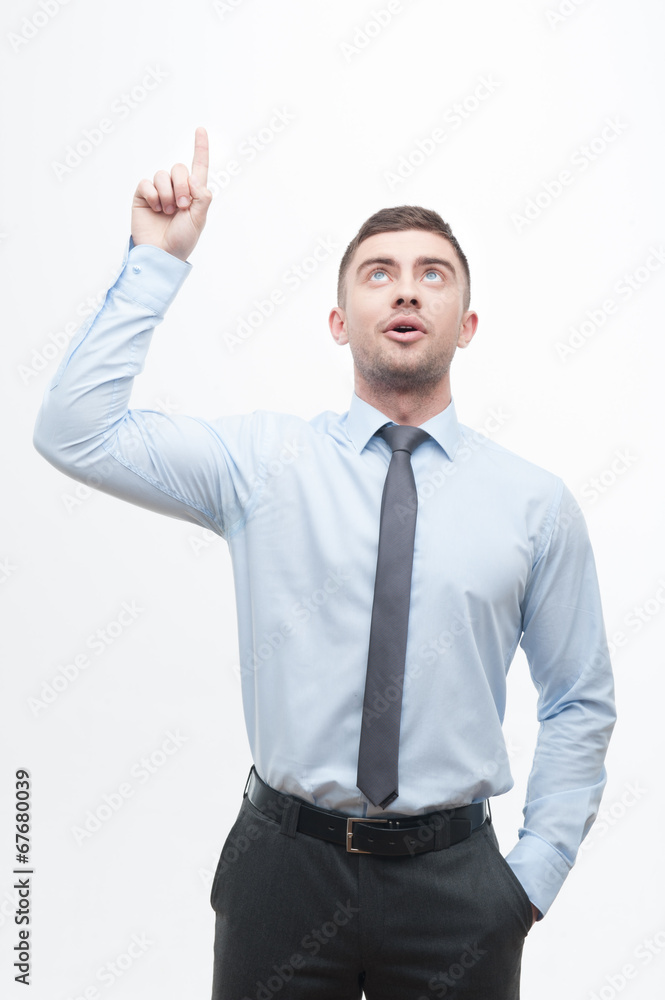 Junior handsome manager showing process of idea search Junior handsome manager showing process of idea search