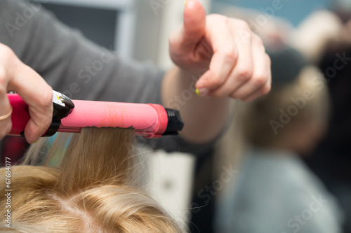 wrap curling hair in a beauty salon © schankz