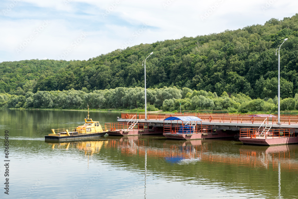 tug boat sets section of the pontoon bridge tug boat sets section of the pontoon bridge
