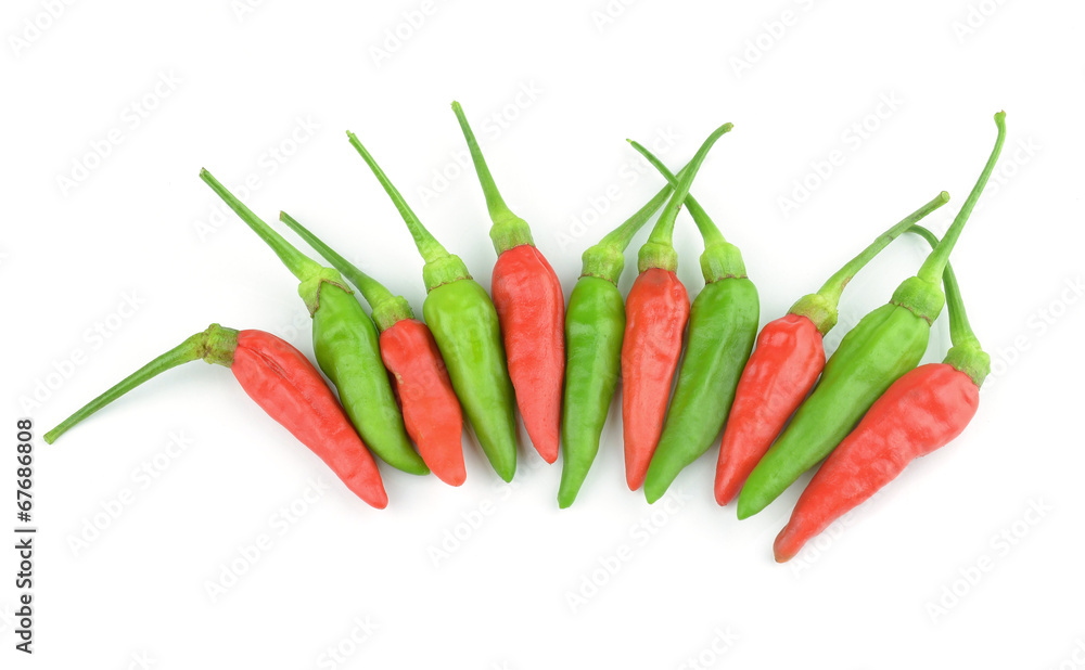 Red and green peppers on white background