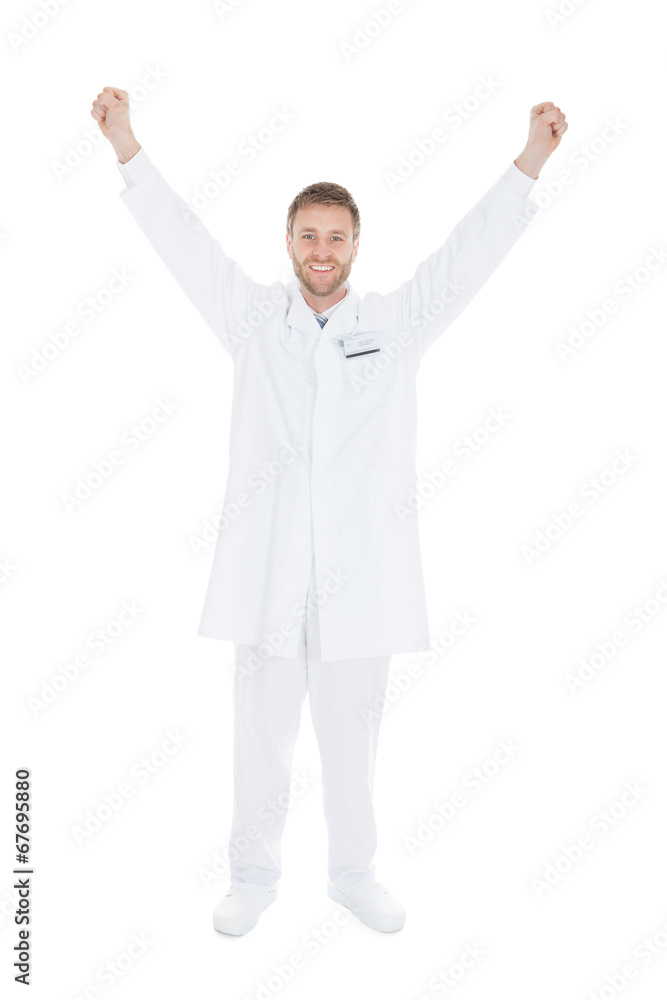 Successful Young Male Doctor With Arms Raised Successful Young Male Doctor With Arms Raised