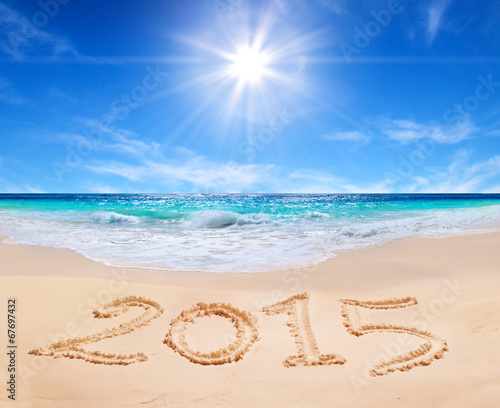 word "2015" on the tropical beach