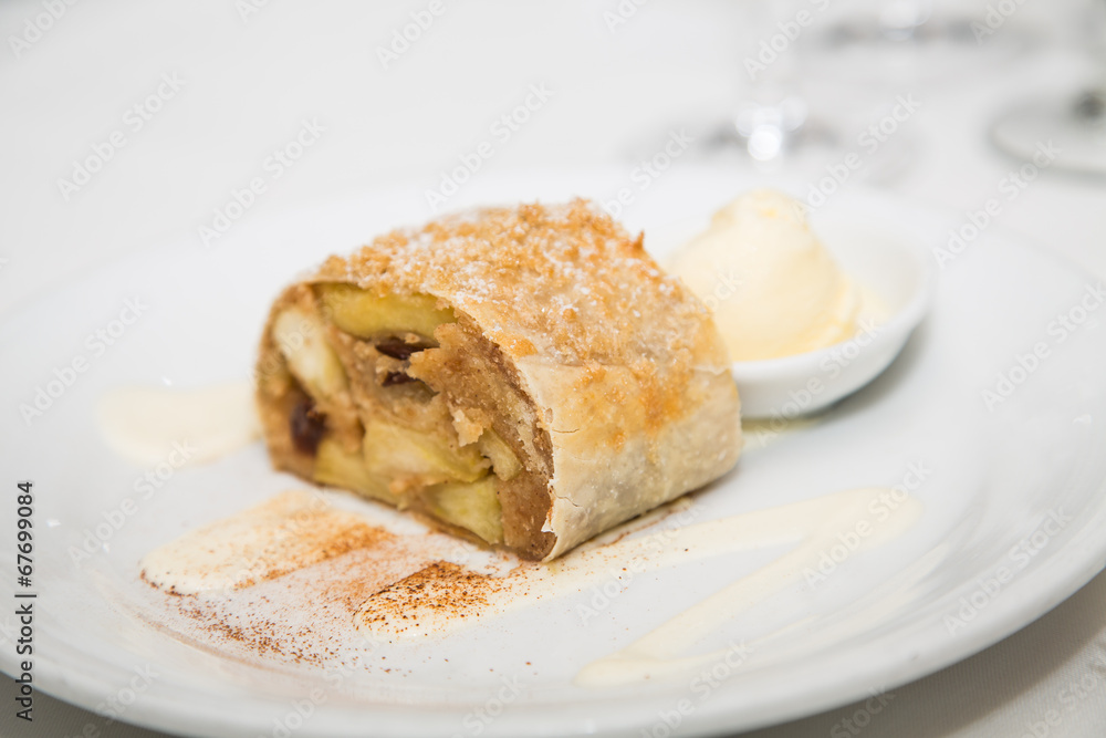 Apple Tart on Plate with Vanilla Ice Cream and Cinammon