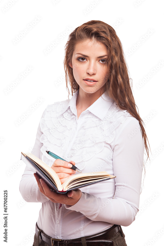 Successful businesswoman or entrepreneur taking notes Successful businesswoman or entrepreneur taking notes