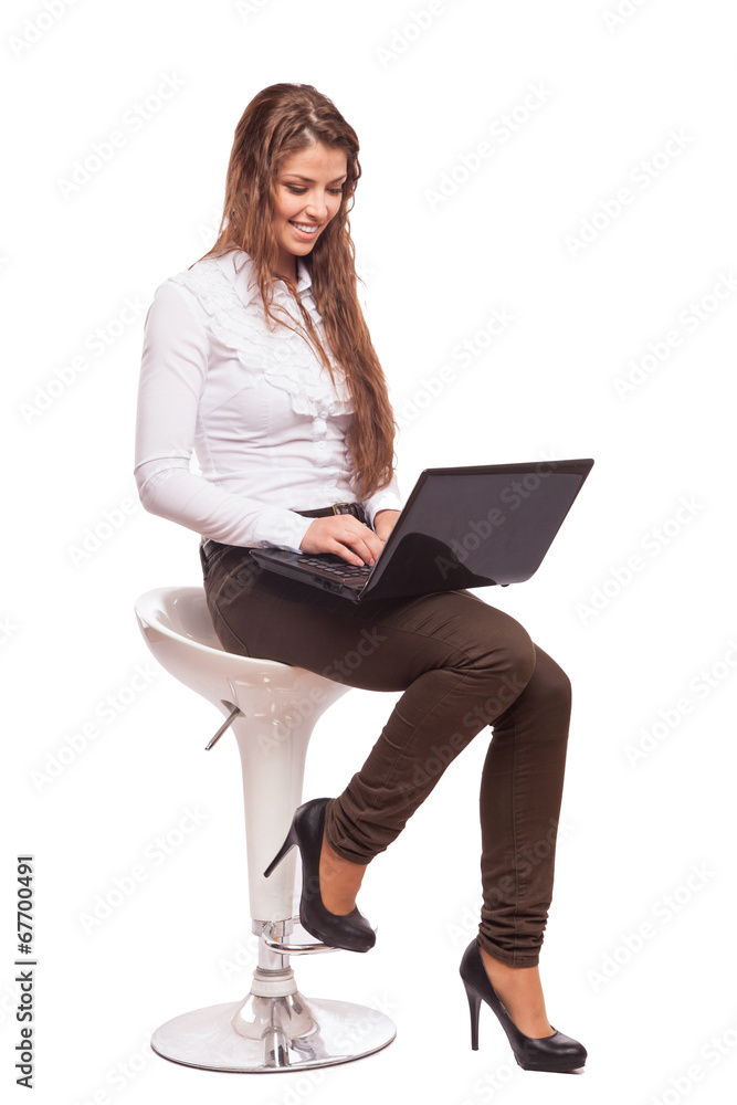 Fototapeta premium Young pretty business woman with notebook