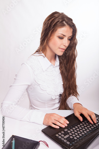  Laptop.Woman.Girl. Businesswoman.Girl working at the laptop