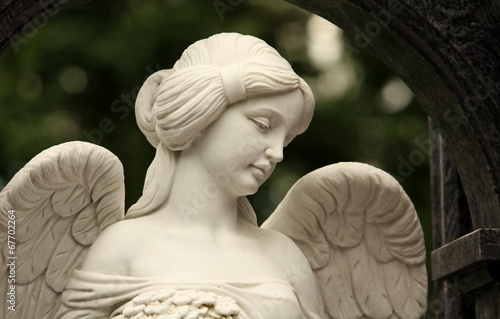 mournful angel with with a female face