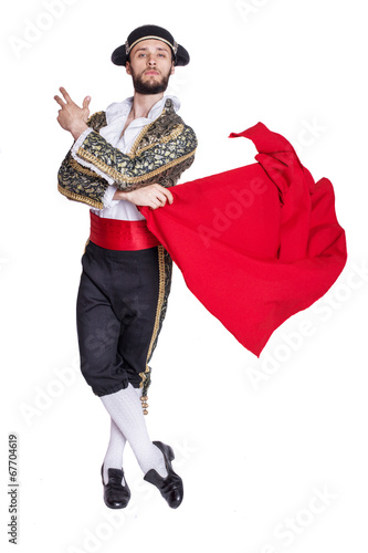 Male dressed as matador on a white background