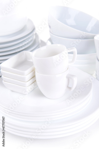 Set of white dishes close-up