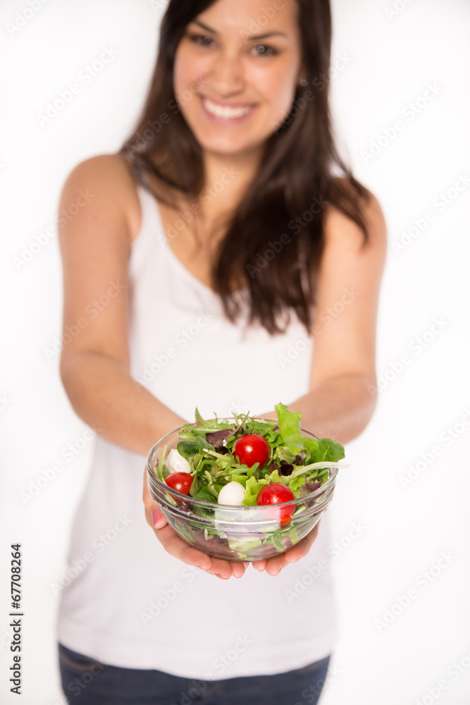 Attractive smiling woman eating salat Attractive smiling woman eating salat