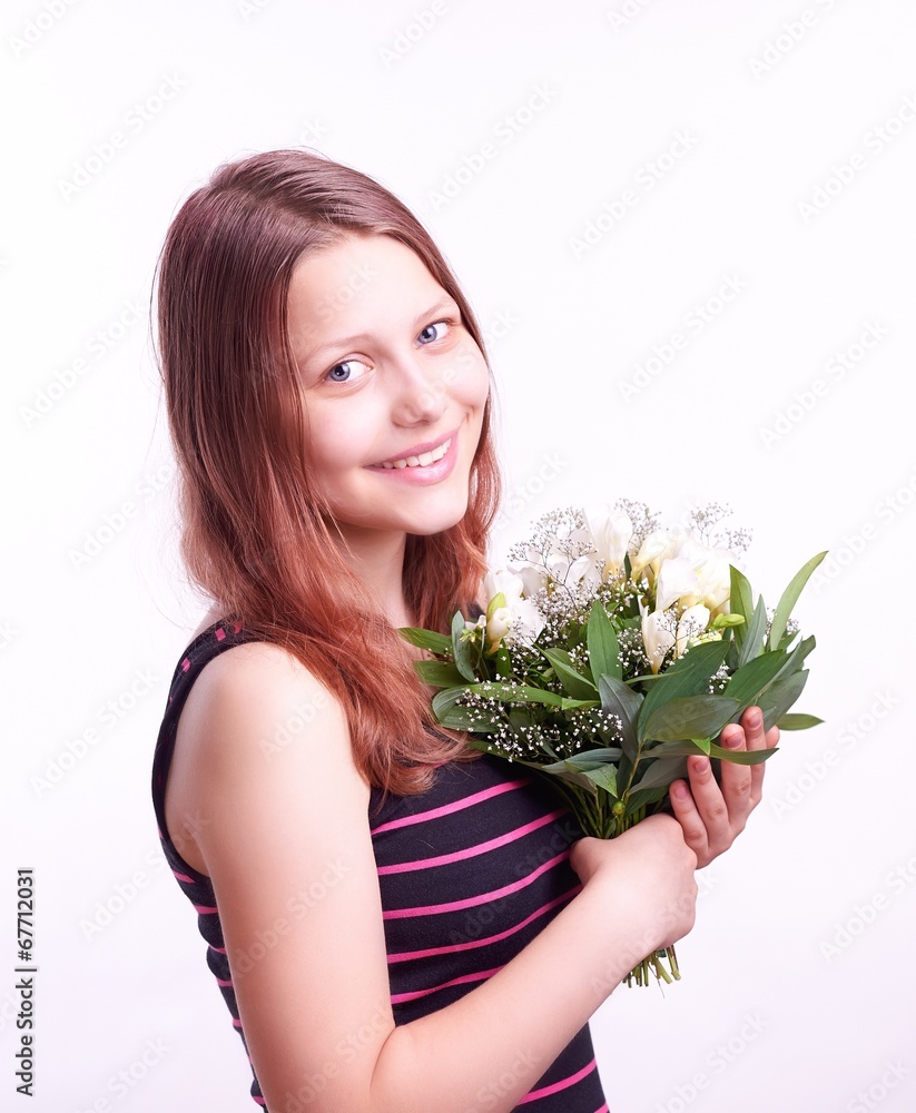 Teen girl with a bouquet of flowers Teen girl with a bouquet of flowers