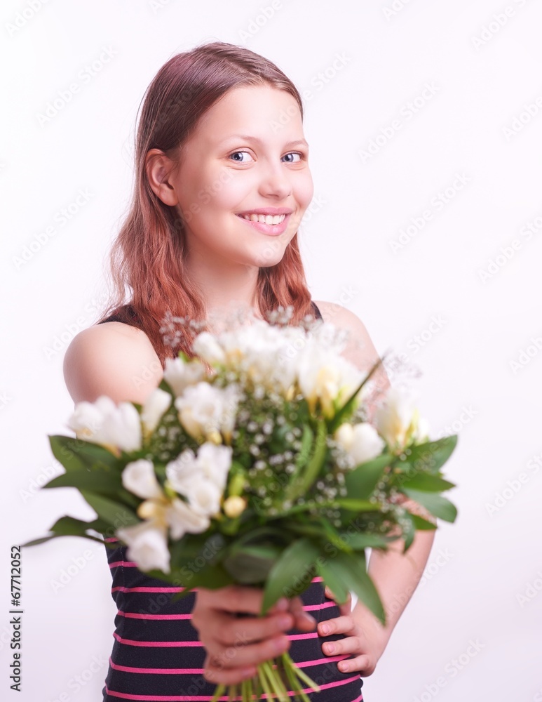 Teen girl with a bouquet of flowers Teen girl with a bouquet of flowers