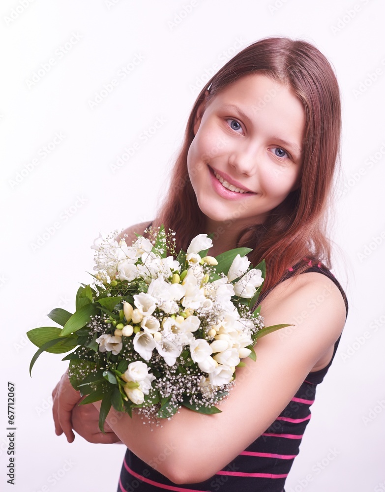 Teen girl with a bouquet of flowers Teen girl with a bouquet of flowers