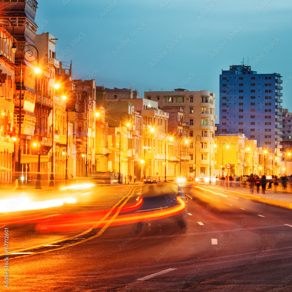 Sunset in Old Havana with  the street lights of El Malecon