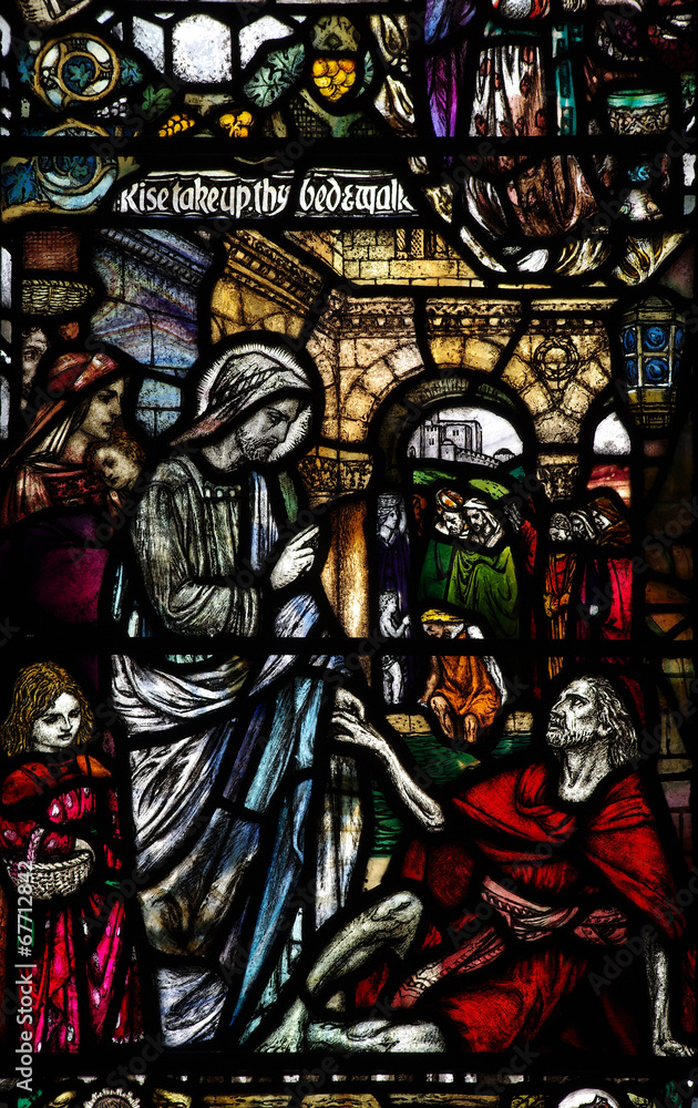 Obraz premium Wonder of Jesus in stained glass: helping a cripple