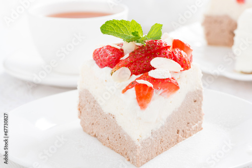 piece of cake with whipped cream and strawberries