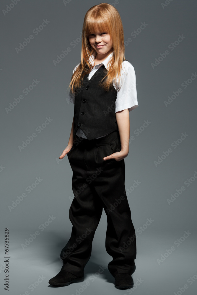 Little fashionable girl in black costume isolated Little fashionable girl in black costume isolated