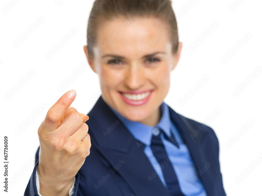 Closeup on business woman beckoning with finger Closeup on business woman beckoning with finger