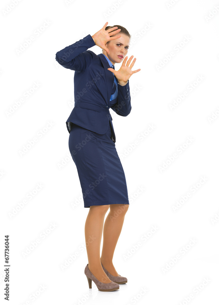 Full length portrait of frightened business woman Full length portrait of frightened business woman