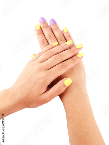 Female hand with stylish colorful nails, isolated on white