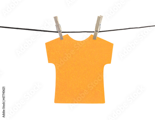 Flat orange T-shirt sticky note hanged, isolated photo