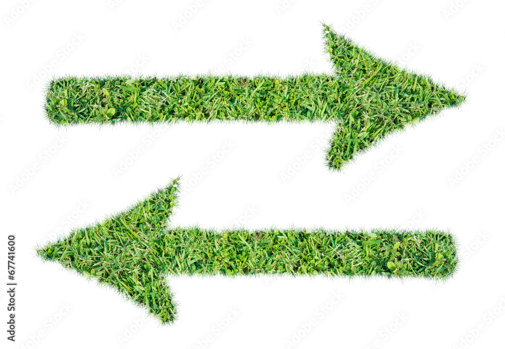 Arrow symbol from green grass isolated Arrow symbol from green grass isolated
