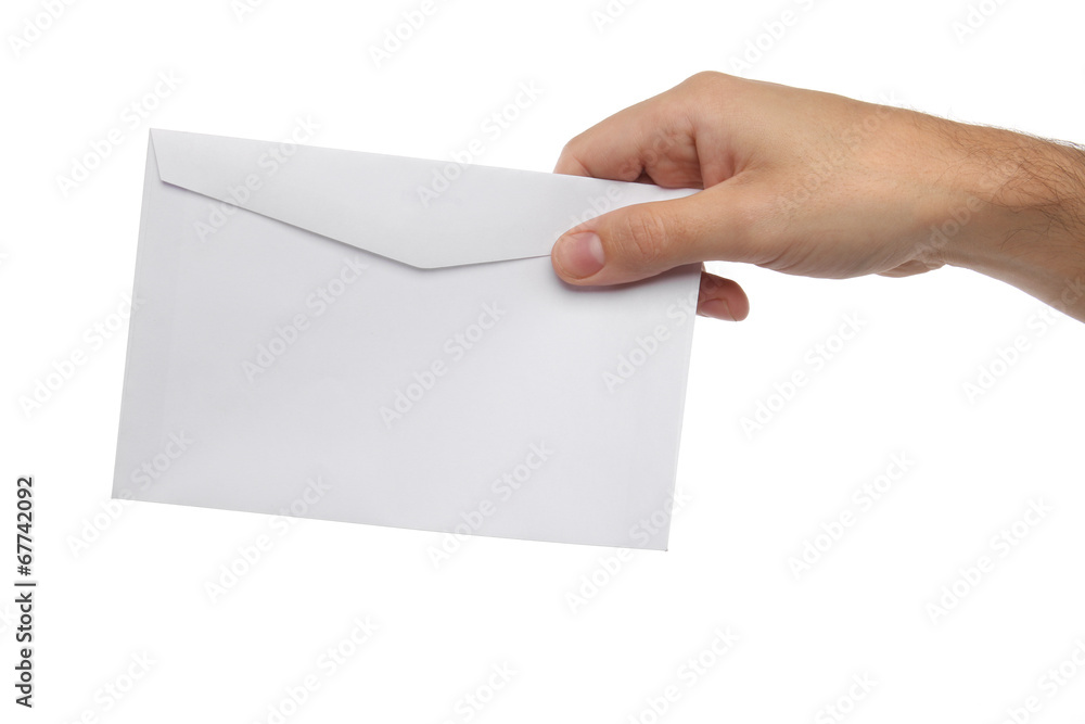 Male hand holding blank envelope isolated
