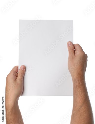 Male hands holding blank paper isolated