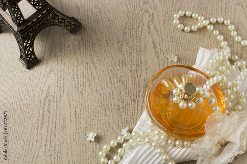 Elegance Perfume Bottle with white pearls and Eifle tower photo