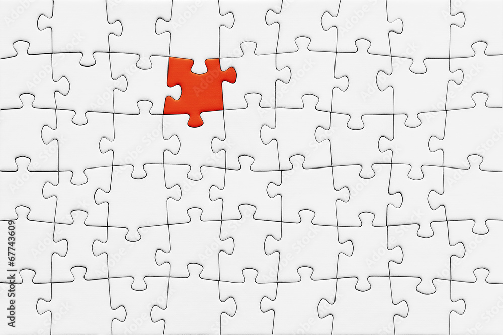 Jigsaw puzzle with blank white pieces and one red piece Jigsaw puzzle with blank white pieces and one red piece