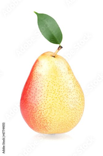 Ripe pear with green leaf