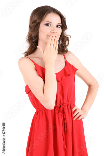 Beautiful young girl in red dress isolated on white