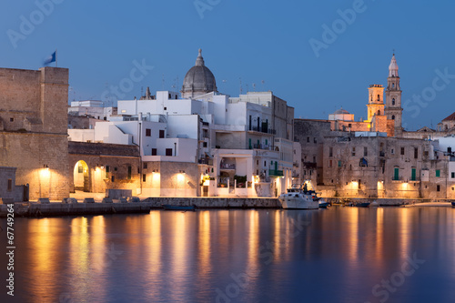 Panoramic nightview of Monopoli seaport. Apulia.