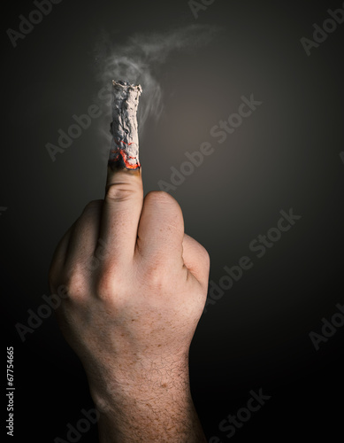 Fotografi stop smoking concept. cigarette like a middle finger