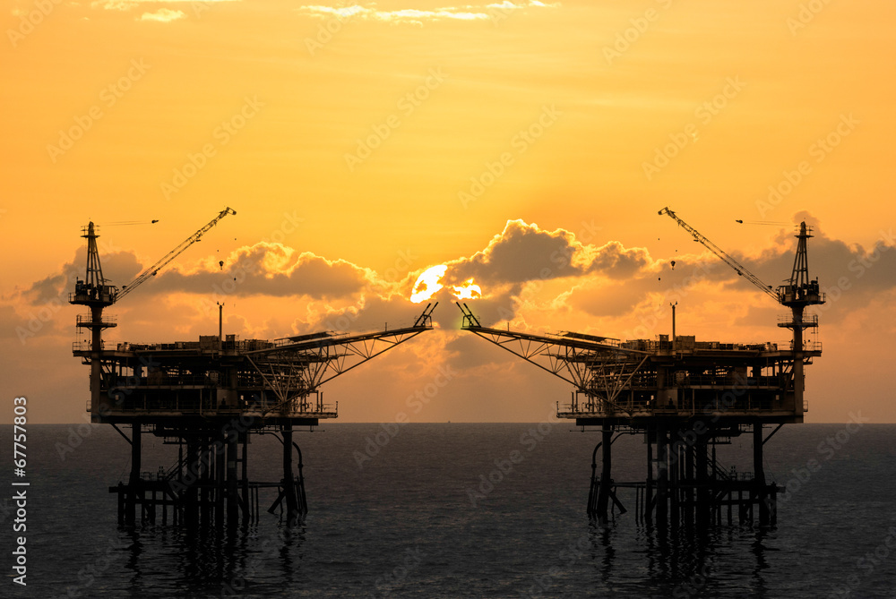 rig platform silhouette in oil and gas industry when sunset
