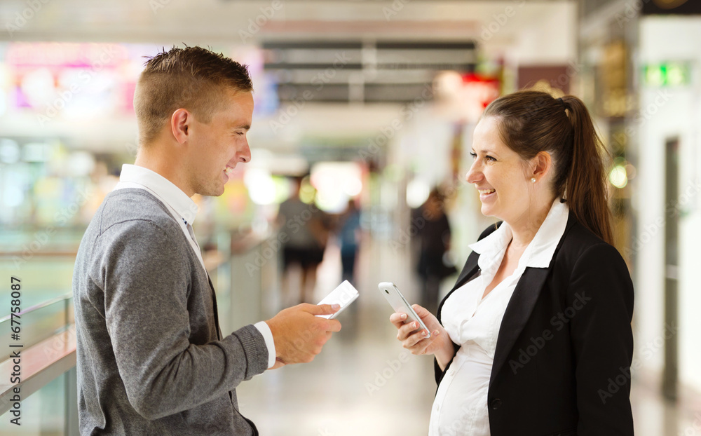 Business meeting in shopping mall Business meeting in shopping mall