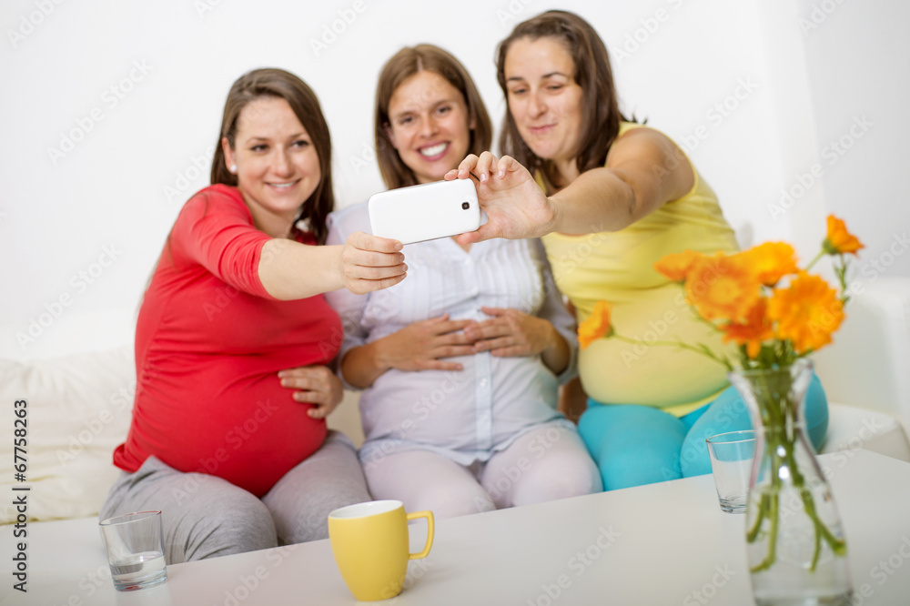 Pregnant women on sofa Pregnant women on sofa
