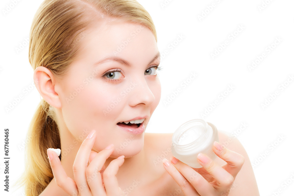 Skin care. Girl applying moisturizing cream Skin care. Girl applying moisturizing cream