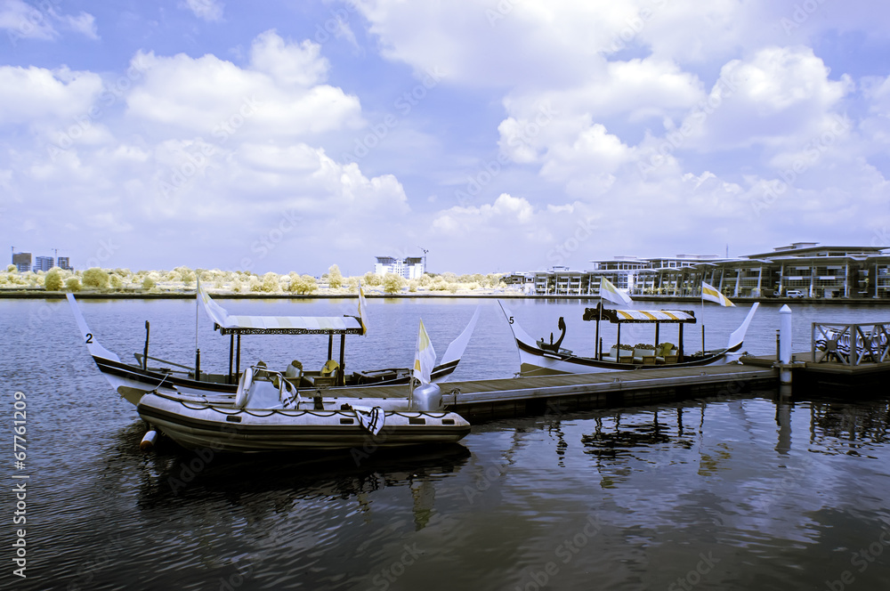 Boats docking by the lakeside viewed in infrared