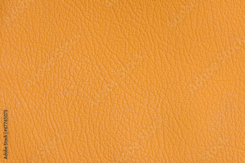 Light orange leather texture background.